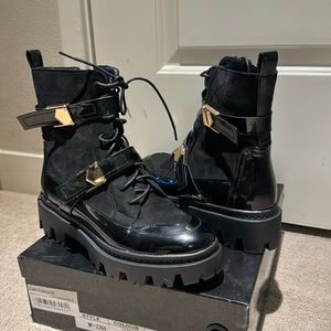 Gently used with box. Pretty Little Things combat booties. Lace up gold buckle.
